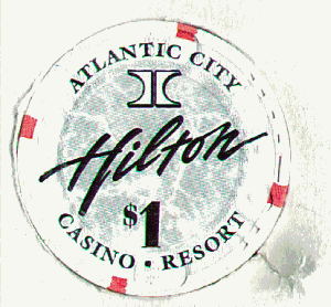 AC Hilton $1 chip. White .4 orange insets. Black lettering