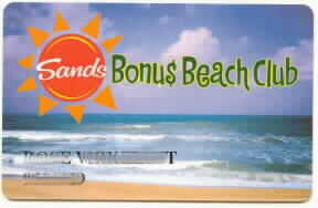 Sands Regency-Bonus Beach Club. Photo of beach. Black name/number. Plastic print a card.